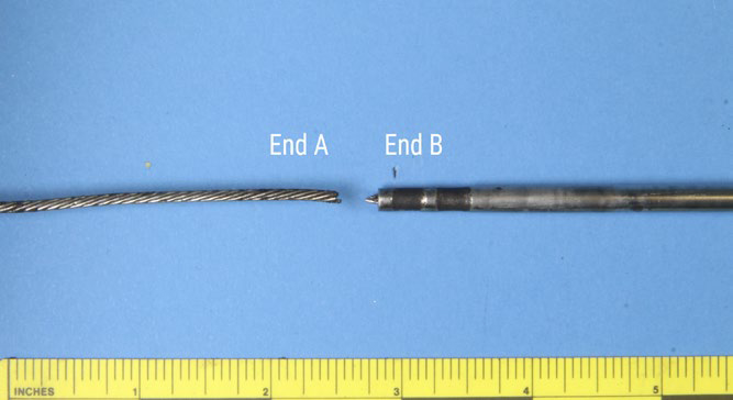 Separated throttle cable.